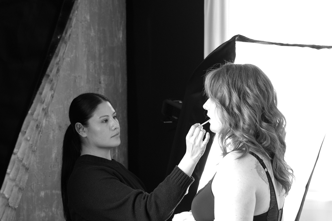 Behind the scenes at Studio Newport — professional hair and makeup in progress.